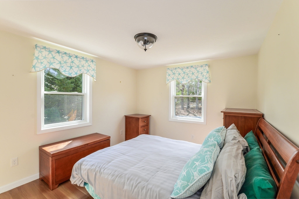 48 Kennedy Circle Barnstable, MA 02601 - Photo 21 of 32 a bedroom with a bed and a window