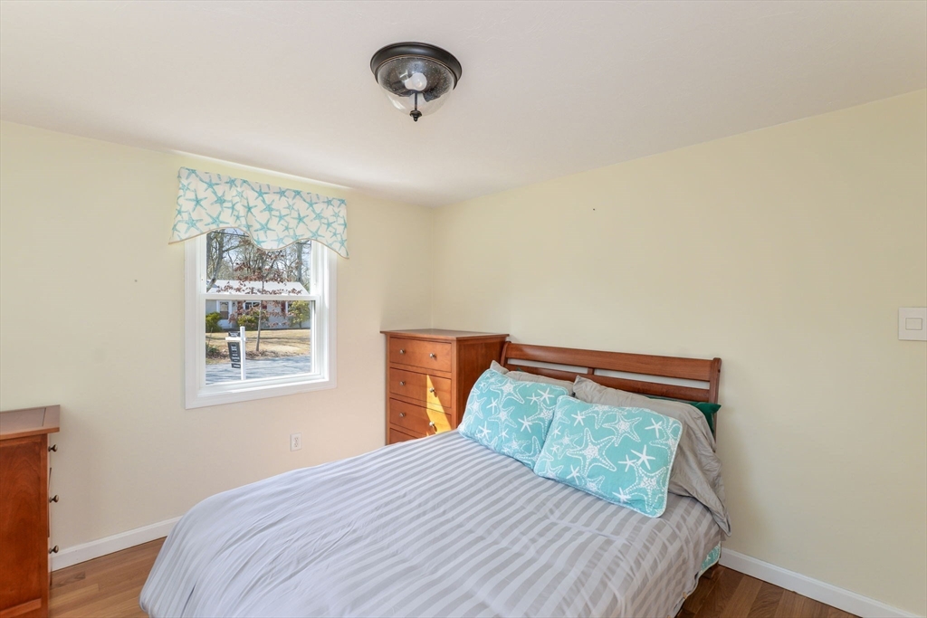 48 Kennedy Circle Barnstable, MA 02601 - Photo 22 of 32 a bedroom with a bed and a window
