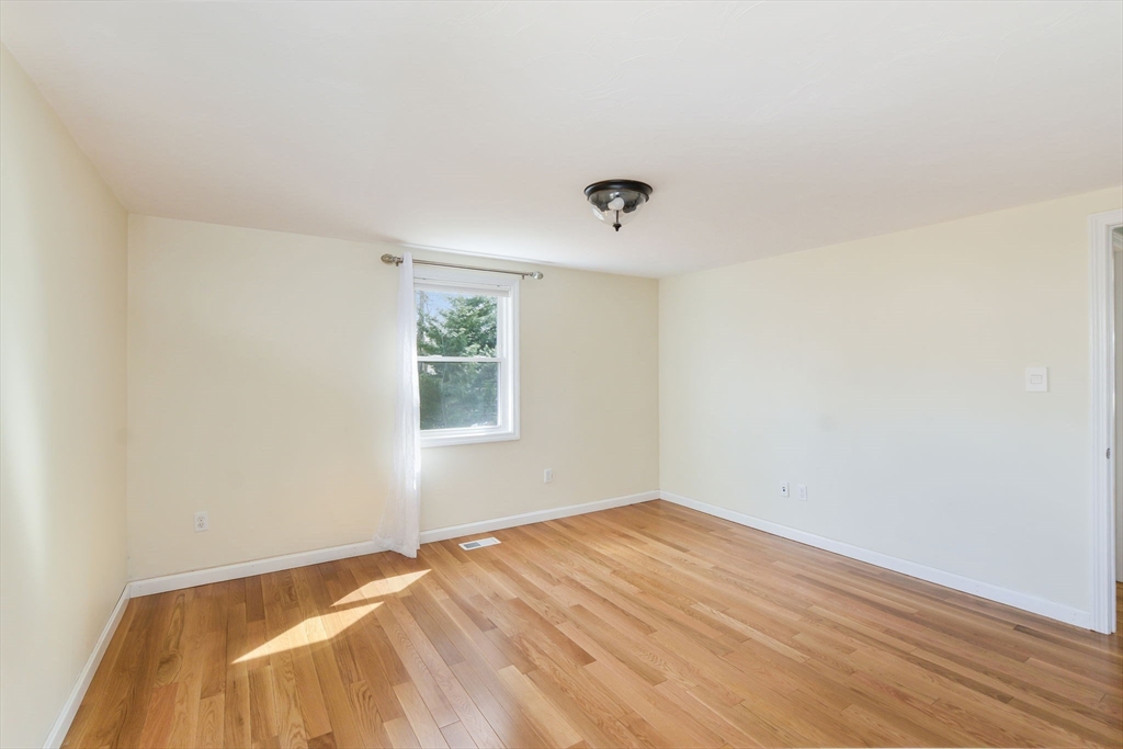 48 Kennedy Circle Barnstable, MA 02601 - Photo 25 of 32 a view of a room with wooden floor and fan
