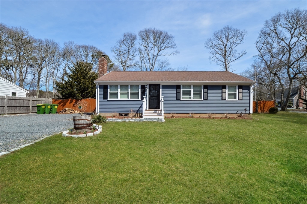 48 Kennedy Circle Barnstable, MA 02601 - Photo 32 of 32 a house view with a garden space