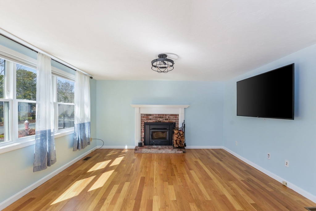 48 Kennedy Circle Barnstable, MA 02601 - Photo 10 of 32 a bedroom with a bed and a flat screen tv