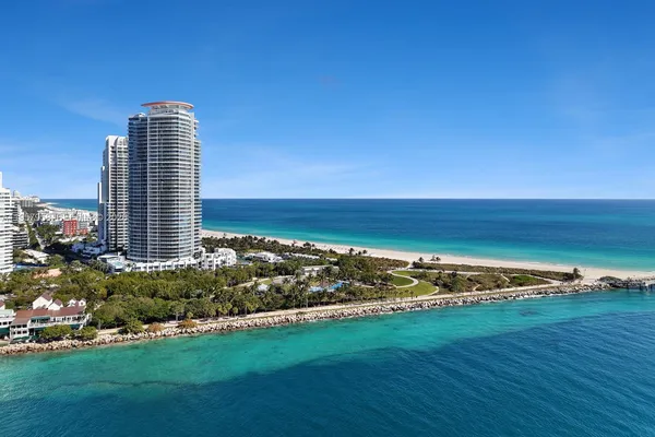 a view of a large building with an ocean view