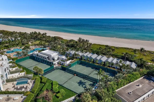 a view of a city with an ocean view