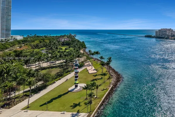 a view of a yard with an ocean