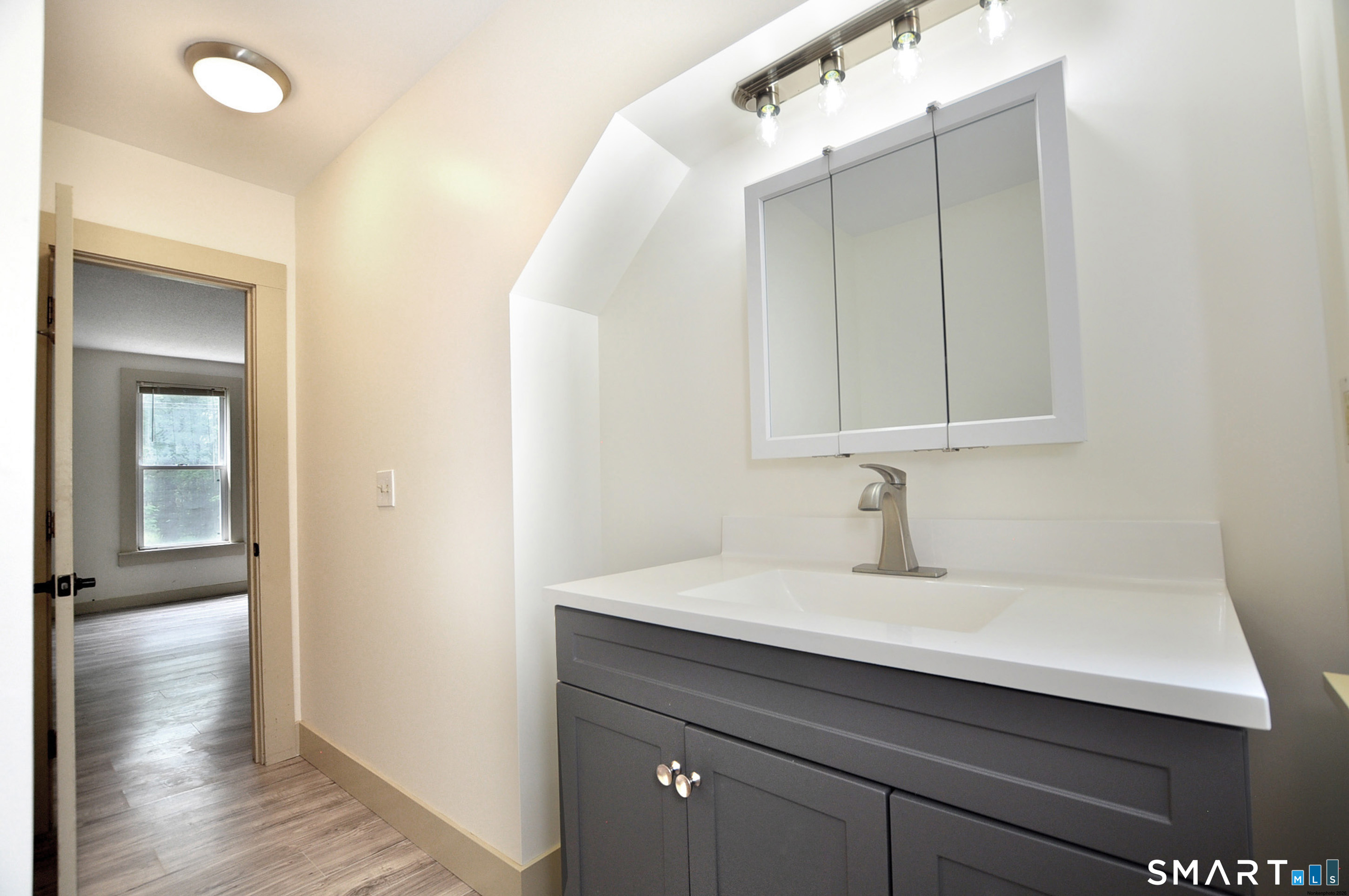 146 Lost Acres Road Granby, CT 06060 - Photo 21 of 28 Main floor bathroom with new vanity
