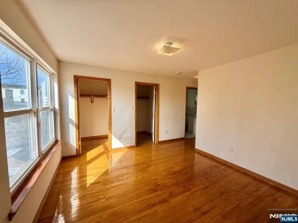 a bathroom with a sink mirror toilet and vanity