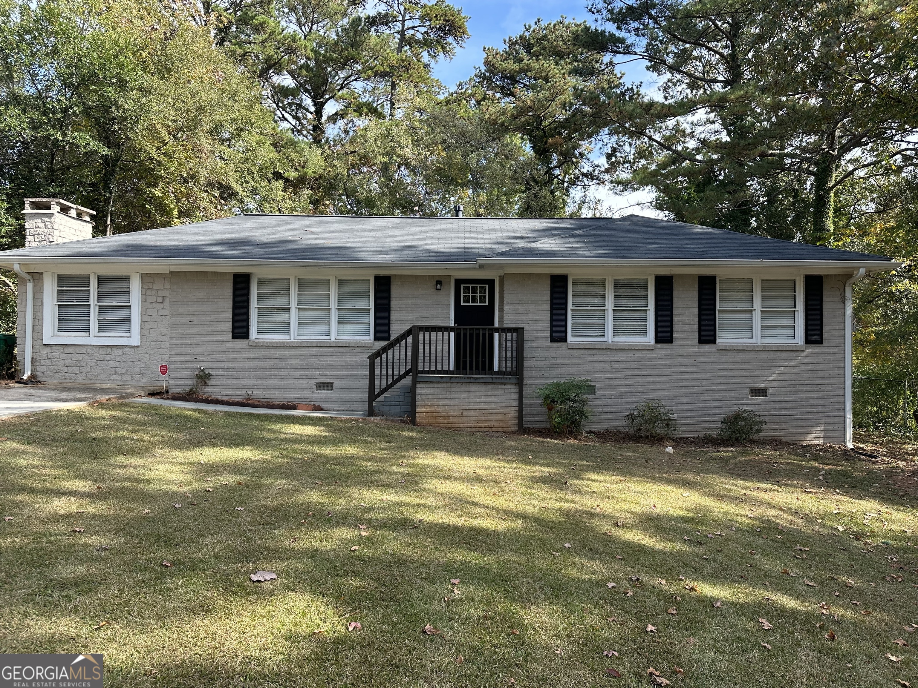 1581 Hollyhock Terrace Decatur, GA 30032 - Photo 2 of 12 a view of a house with a swimming pool