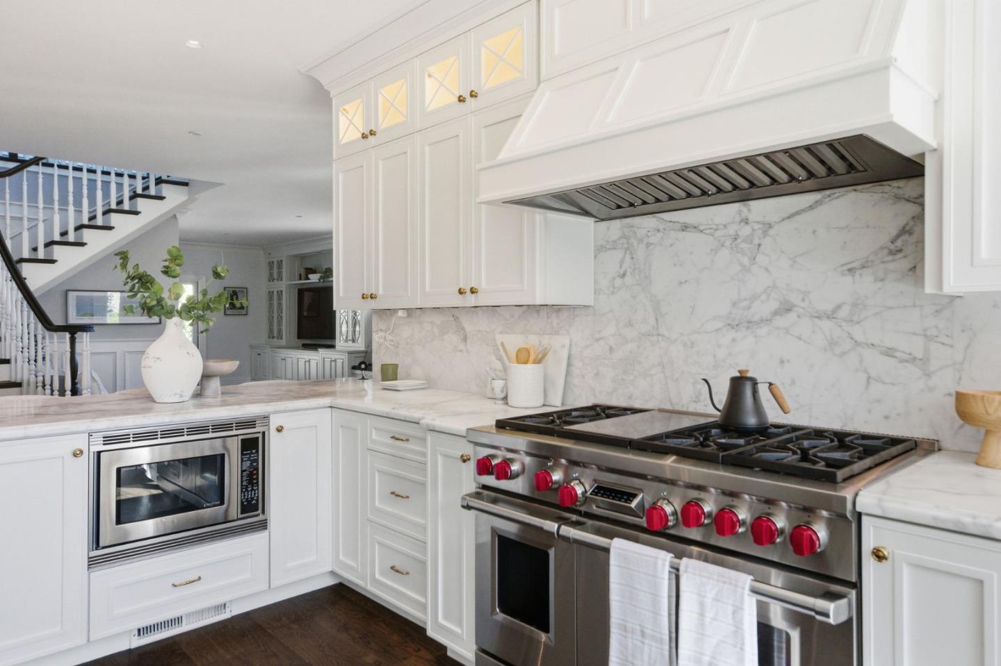 638 Oregon Avenue San Mateo, CA 94402 - Photo 11 of 34 a kitchen with a stove and a white cabinets