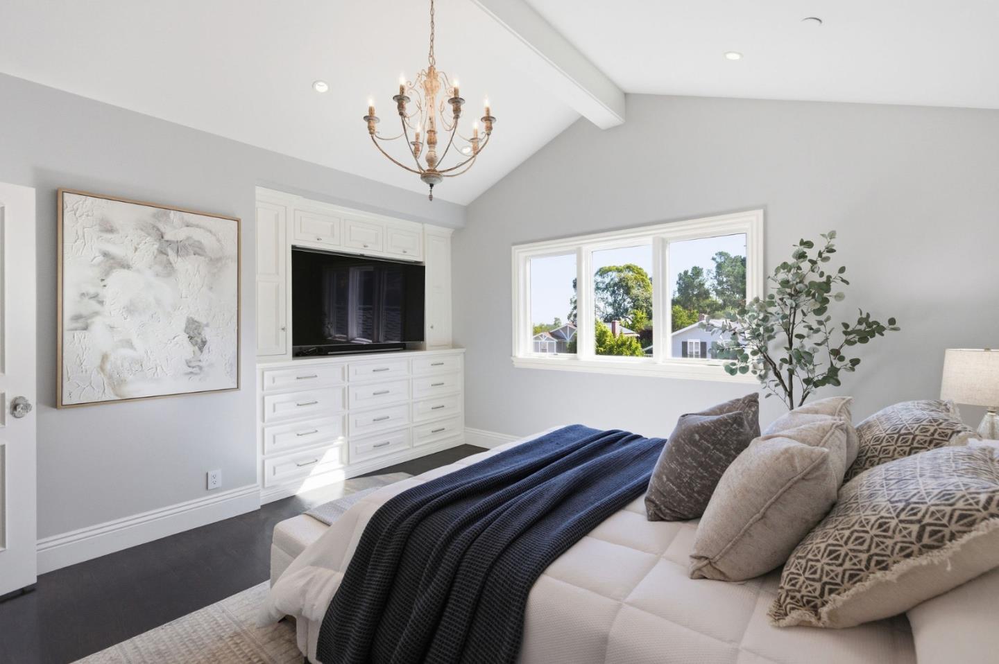 638 Oregon Avenue San Mateo, CA 94402 - Photo 17 of 34 a bedroom with a large bed and a flat screen tv