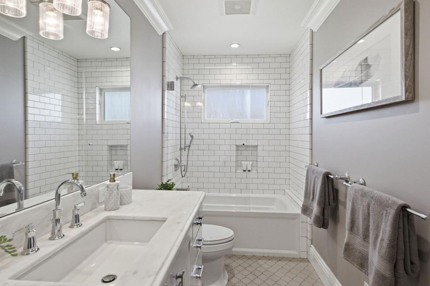 638 Oregon Avenue San Mateo, CA 94402 - Photo 22 of 34 a bathroom with a sink a toilet and shower