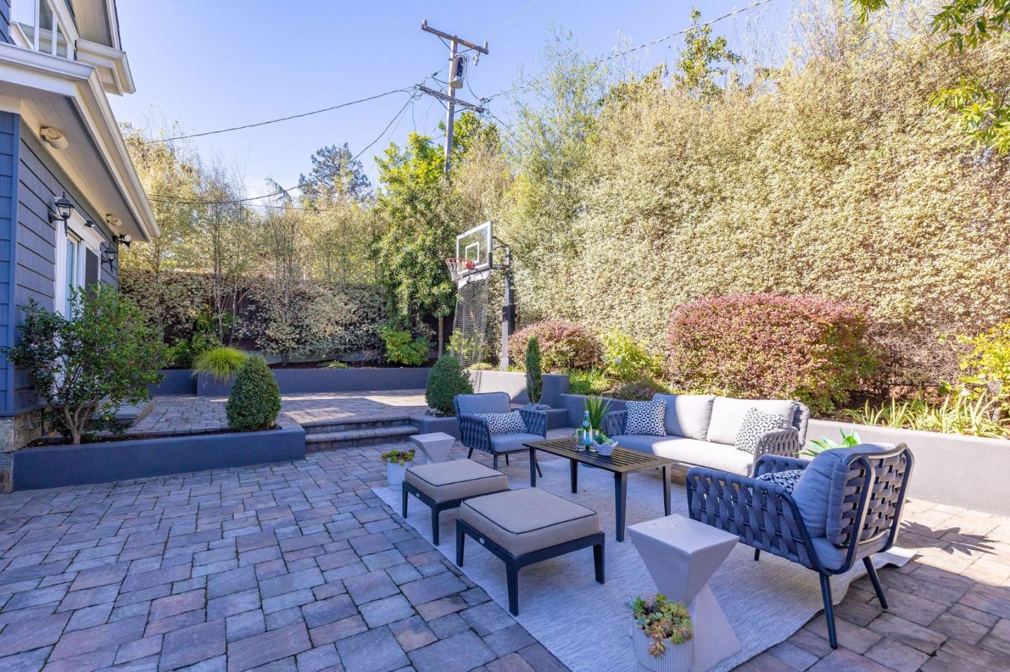 638 Oregon Avenue San Mateo, CA 94402 - Photo 27 of 34 a backyard of a house with fountain table and chairs