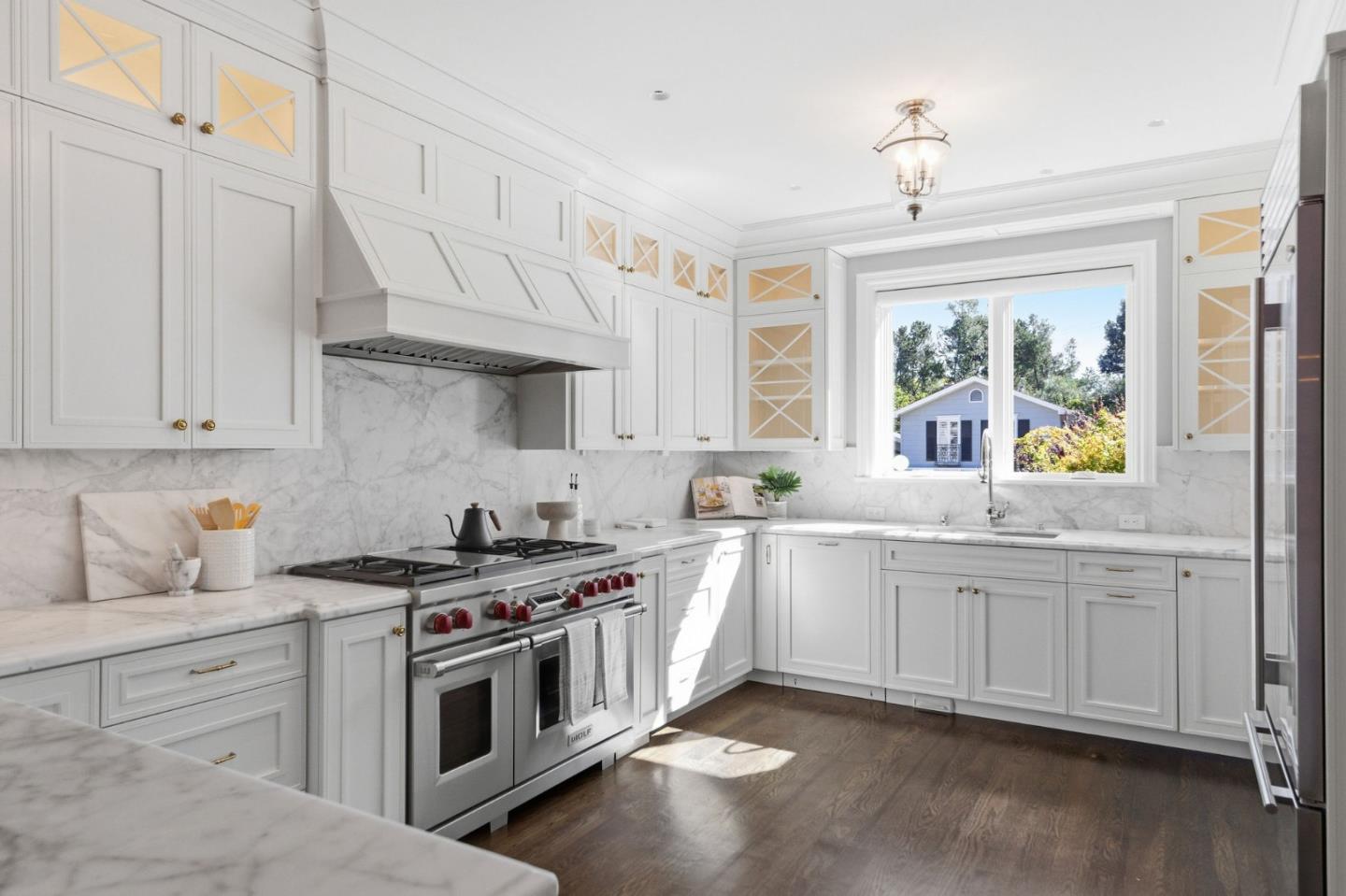 638 Oregon Avenue San Mateo, CA 94402 - Photo 9 of 34 a kitchen with stainless steel appliances a stove sink and cabinets
