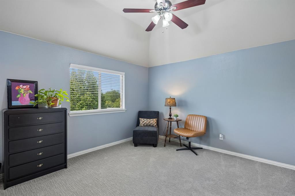 8104 Red Riv Run North Richland Hills, TX 76180 - Photo 28 of 38 a living room with furniture and a window