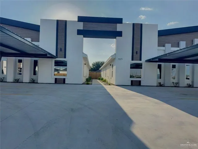 a view of a building with a street