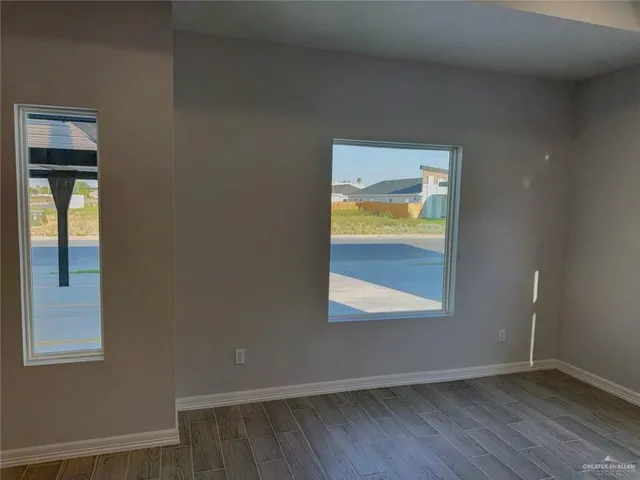 a kitchen with stainless steel appliances a refrigerator sink and microwave