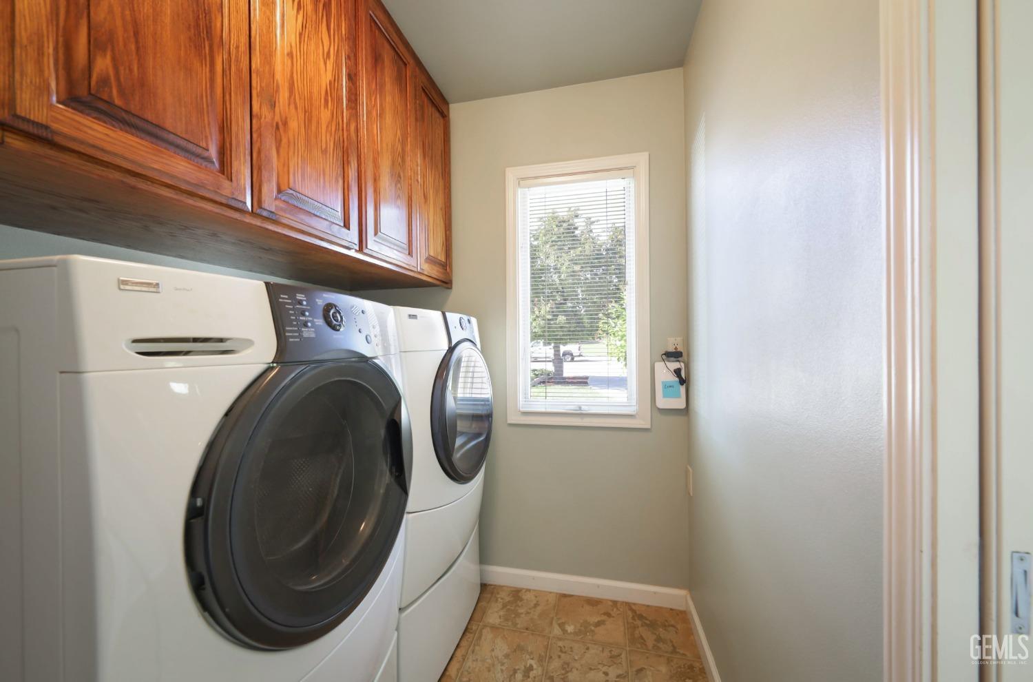 Undisclosed Address Bakersfield, CA 93305 - Photo 21 of 33 a utility room with dryer and washer