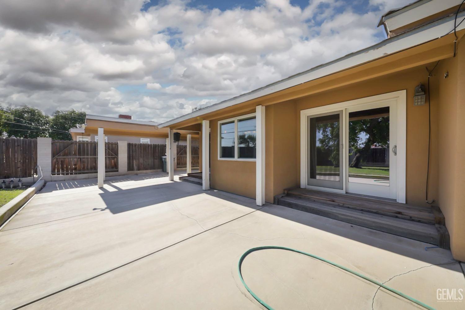 Undisclosed Address Bakersfield, CA 93305 - Photo 22 of 33 a front view of house with yard