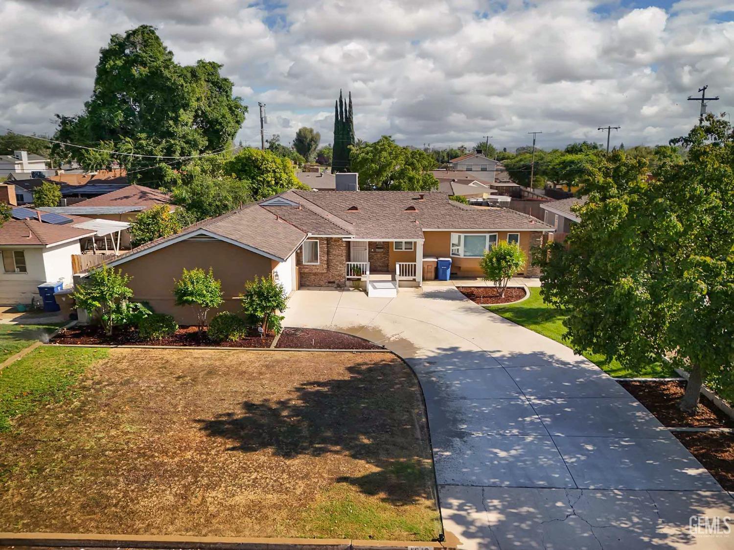Undisclosed Address Bakersfield, CA 93305 - Photo 27 of 33 a view of multiple houses with a yard