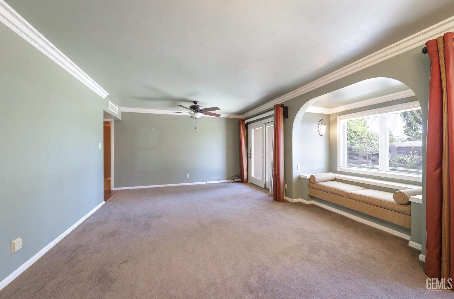 Undisclosed Address Bakersfield, CA 93305 - Photo 6 of 33 a view of empty room with floor to ceiling window