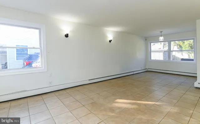 an empty room with windows