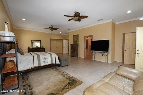 a view of a small space with wooden floor