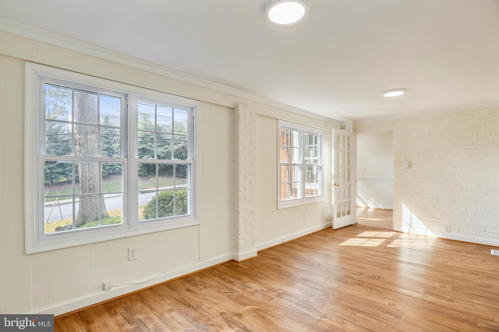 1509 Forest Glen Road Silver Spring, MD 20902 - Photo 15 of 29 Laminate Floor In Family Room/Sun Room