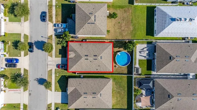 a view of a building with yard