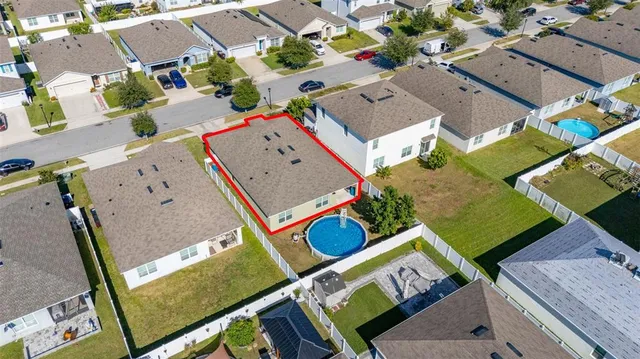 a view of a house with a park