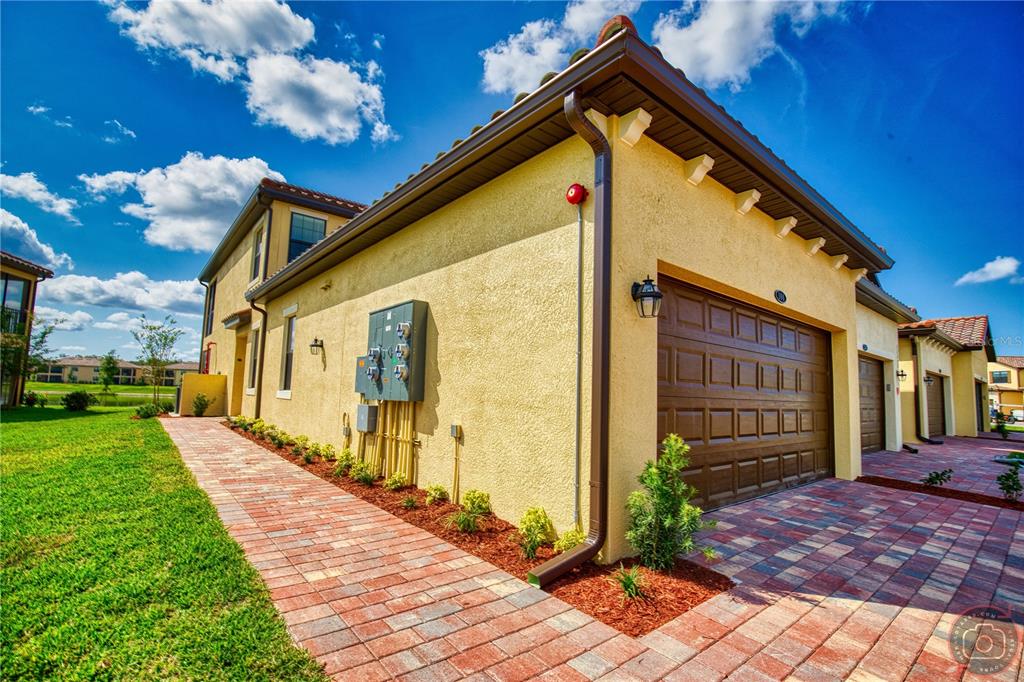 12355 Ghiberti Circle, Unit 101 Venice, FL 34293 - Photo 37 of 41 a view of a house with backyard