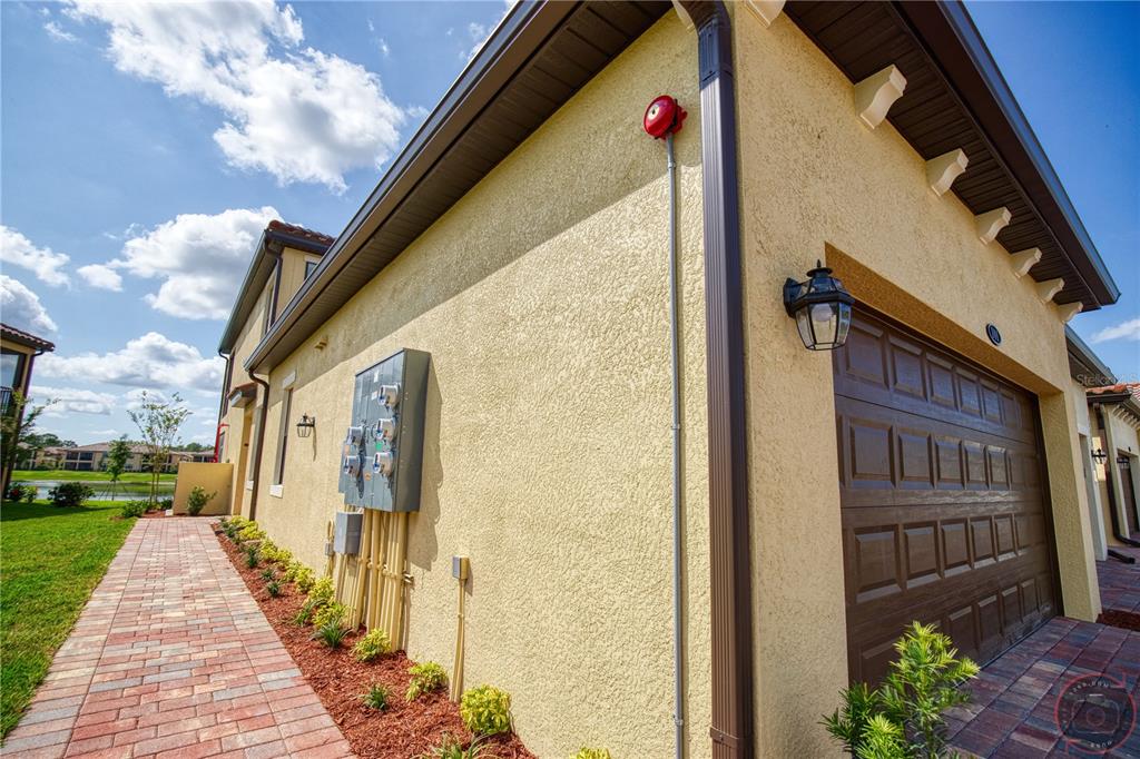 12355 Ghiberti Circle, Unit 101 Venice, FL 34293 - Photo 39 of 41 a view of a house with a yard