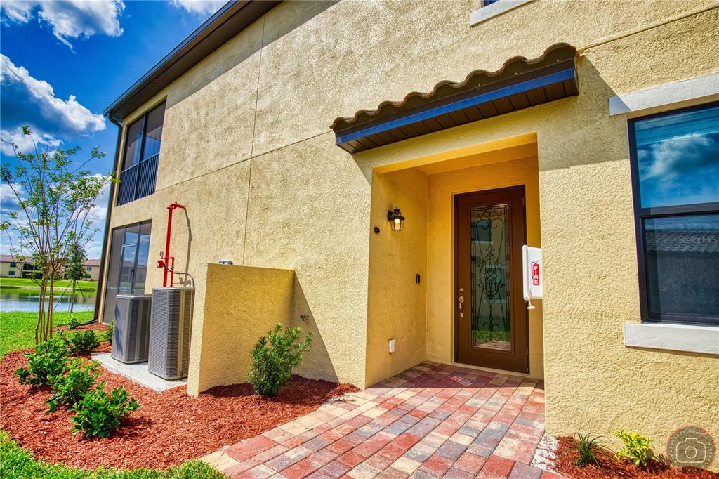 12355 Ghiberti Circle, Unit 101 Venice, FL 34293 - Photo 6 of 41 a view of a entryway door of the house