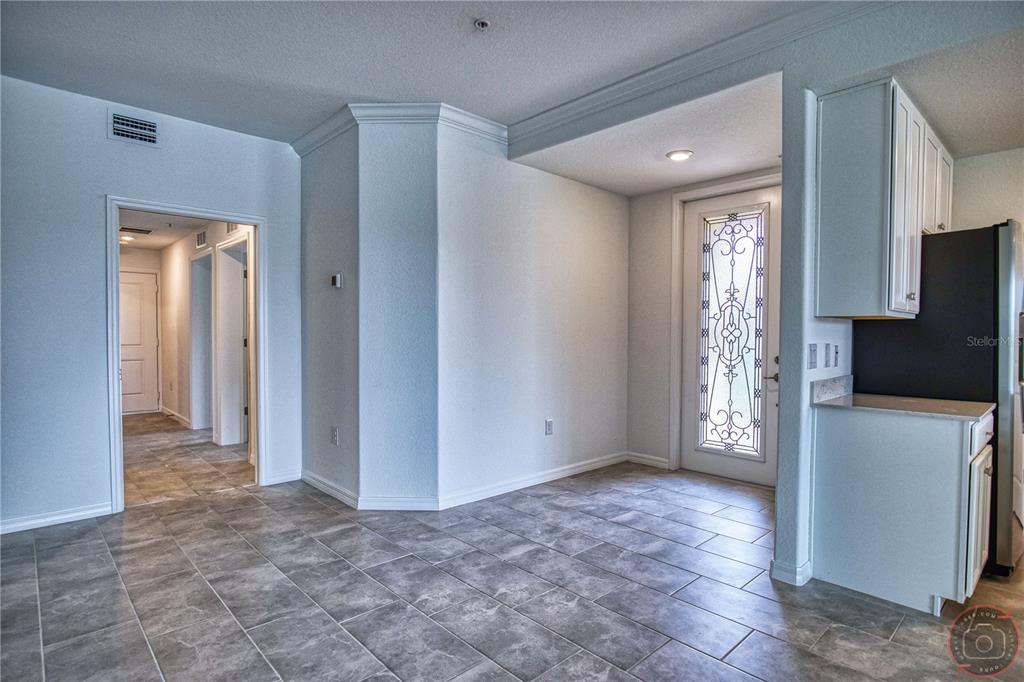 12355 Ghiberti Circle, Unit 101 Venice, FL 34293 - Photo 8 of 41 a view of an empty room and a window