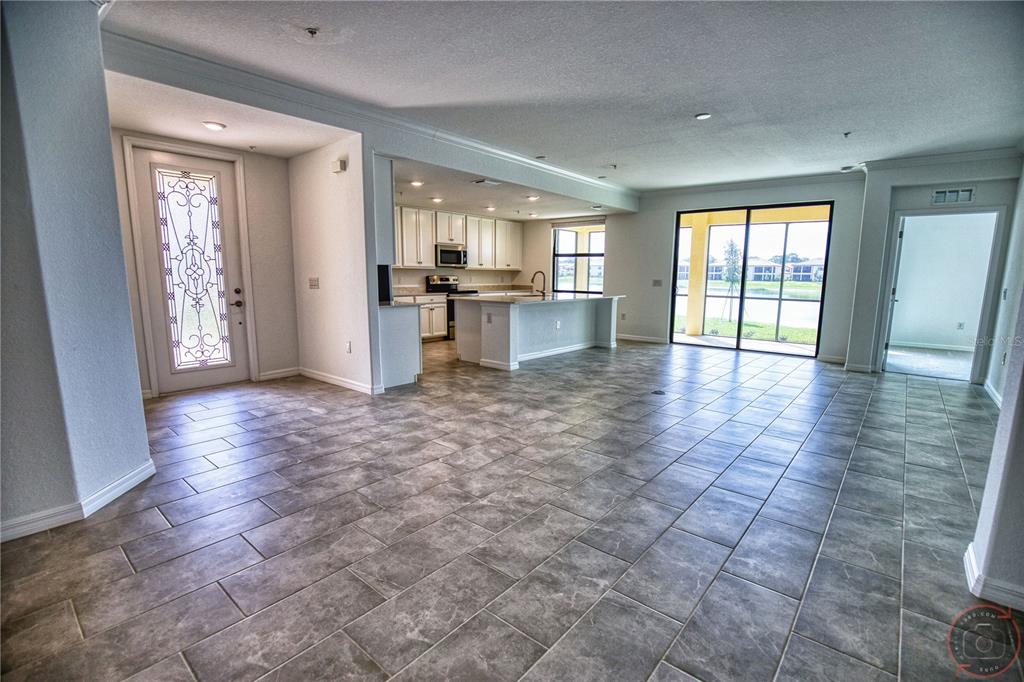 12355 Ghiberti Circle, Unit 101 Venice, FL 34293 - Photo 9 of 41 a view of a kitchen with a sink