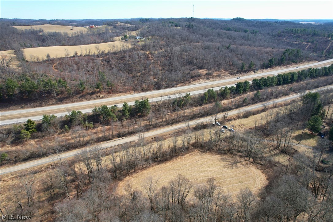 Stonecreek Road Newcomerstown, OH 43832 - Photo 7 of 14 Aerial view of the property showing expansive wooded areas and open fields