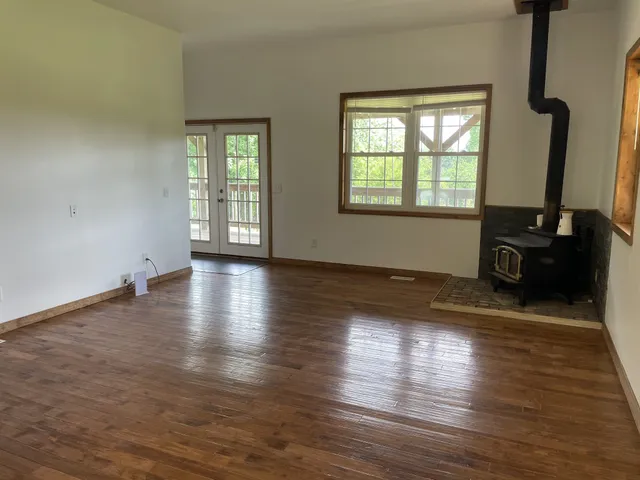 a view of a bedroom from a hallway