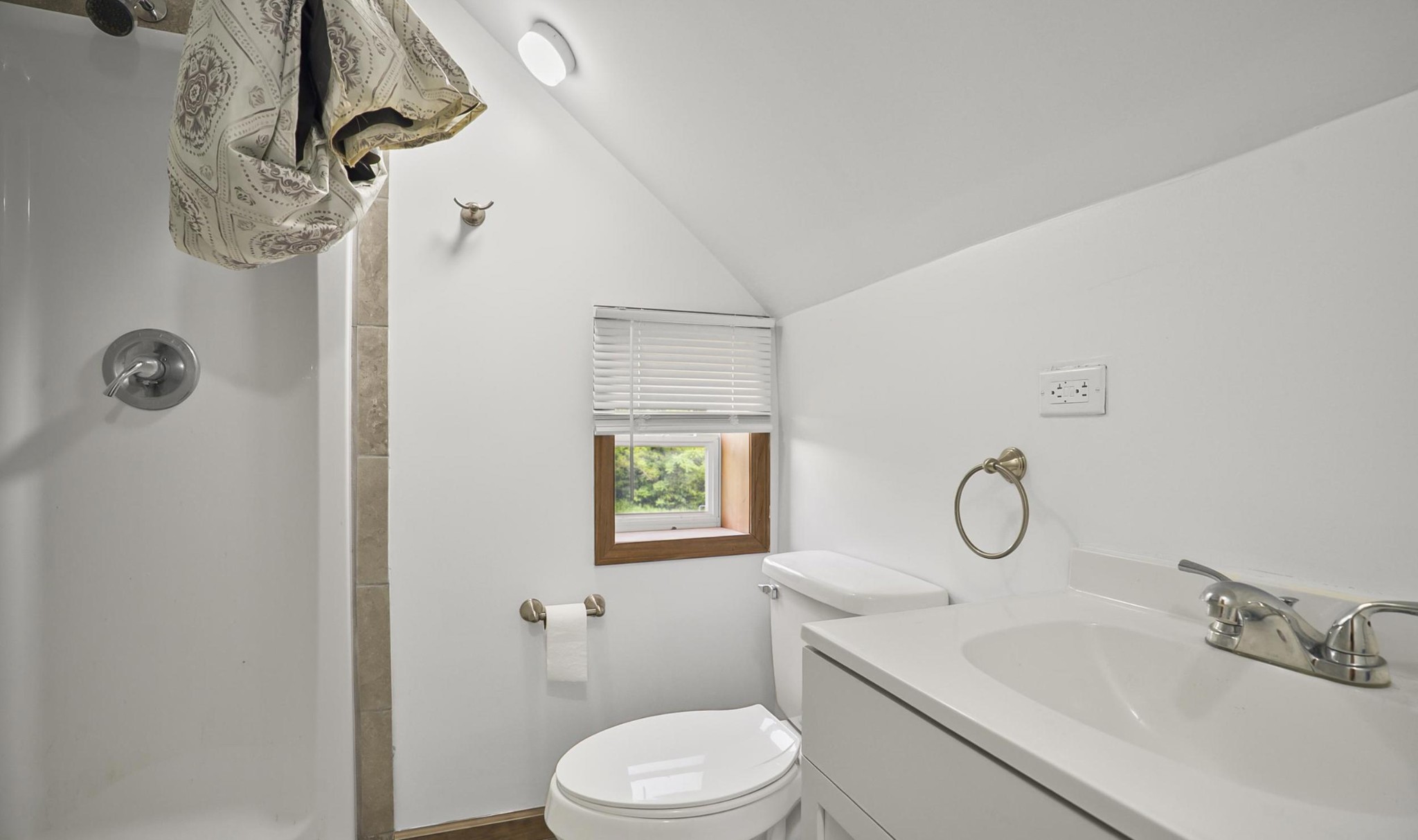 1005 Birdwell Road Red Boiling Springs, TN 37150 - Photo 21 of 59 a bathroom with a sink toilet and shower