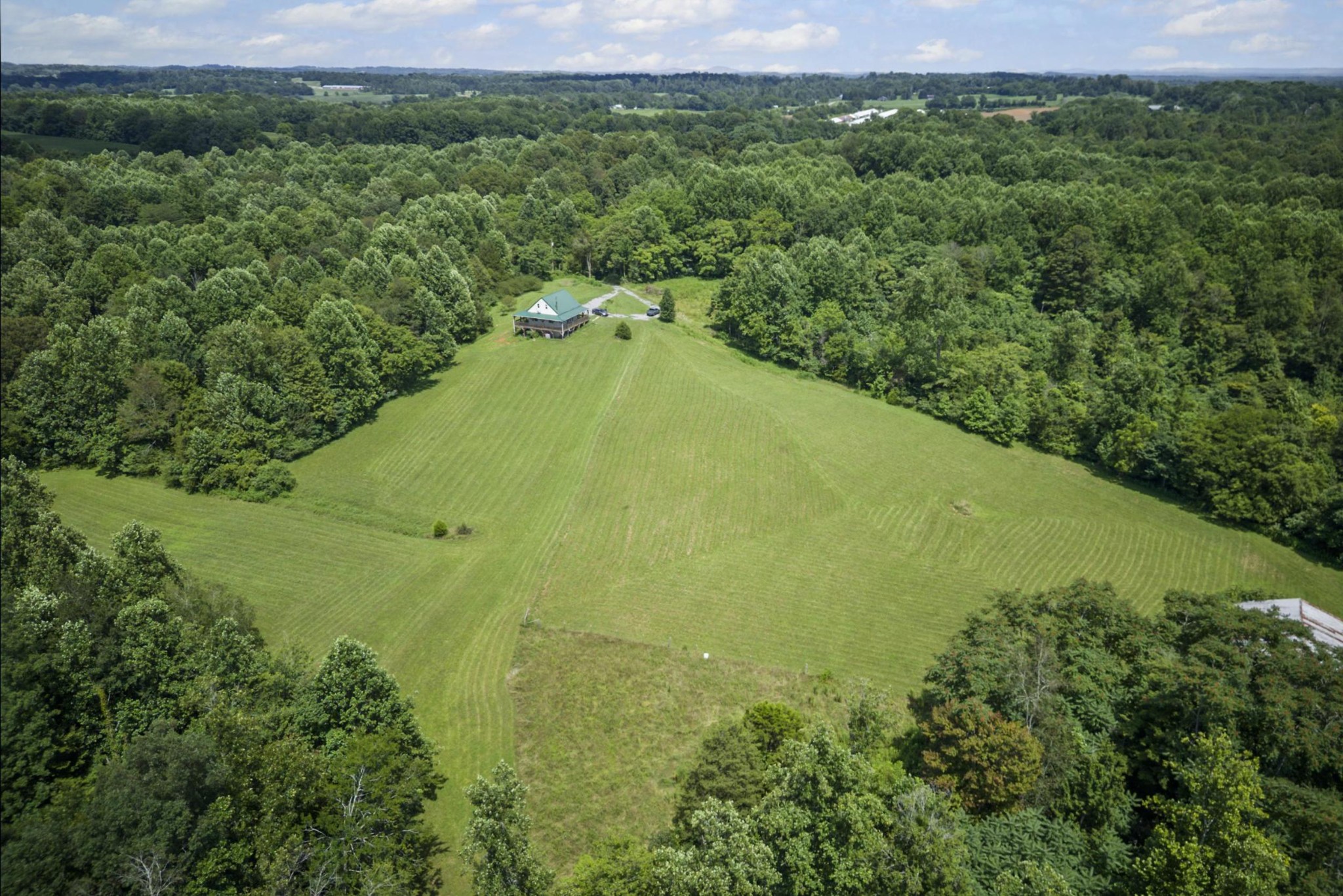 1005 Birdwell Road Red Boiling Springs, TN 37150 - Photo 53 of 59 a view of a field with an ocean view