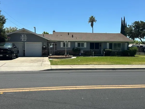 a view of a house with a swimming pool