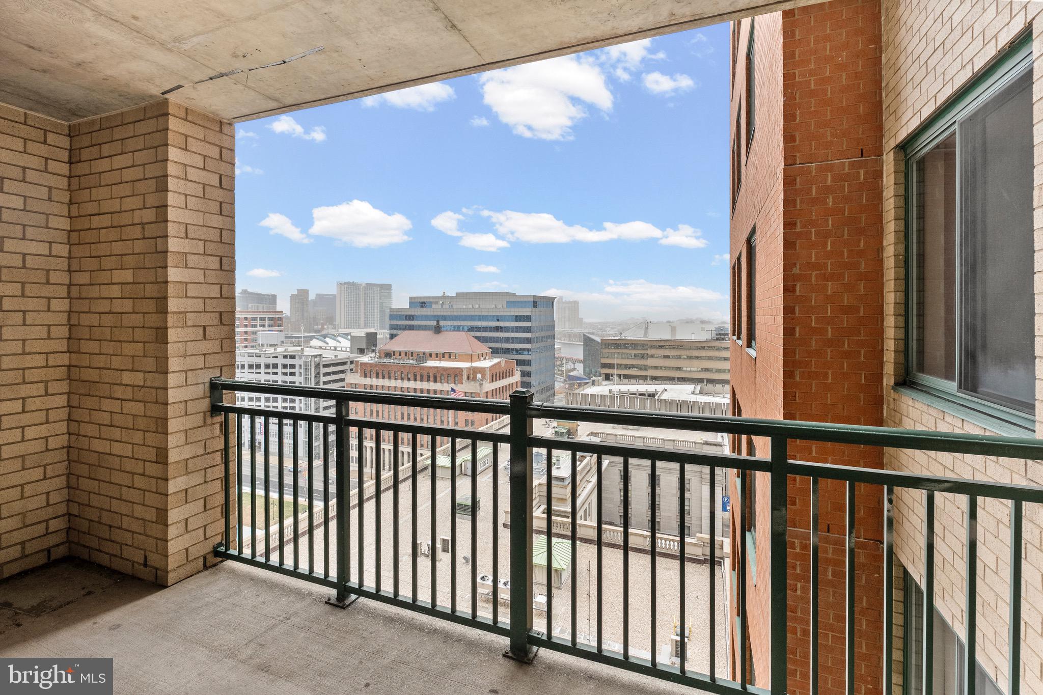 414 Water Street, Unit 1501 Baltimore, MD 21202 - Photo 21 of 21 a view of city from a balcony