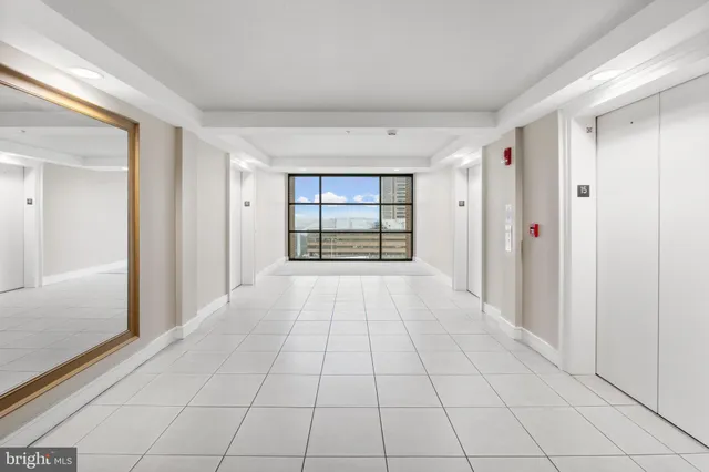 a view of an empty room and window