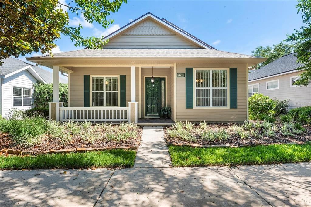 front view of a house with a yard