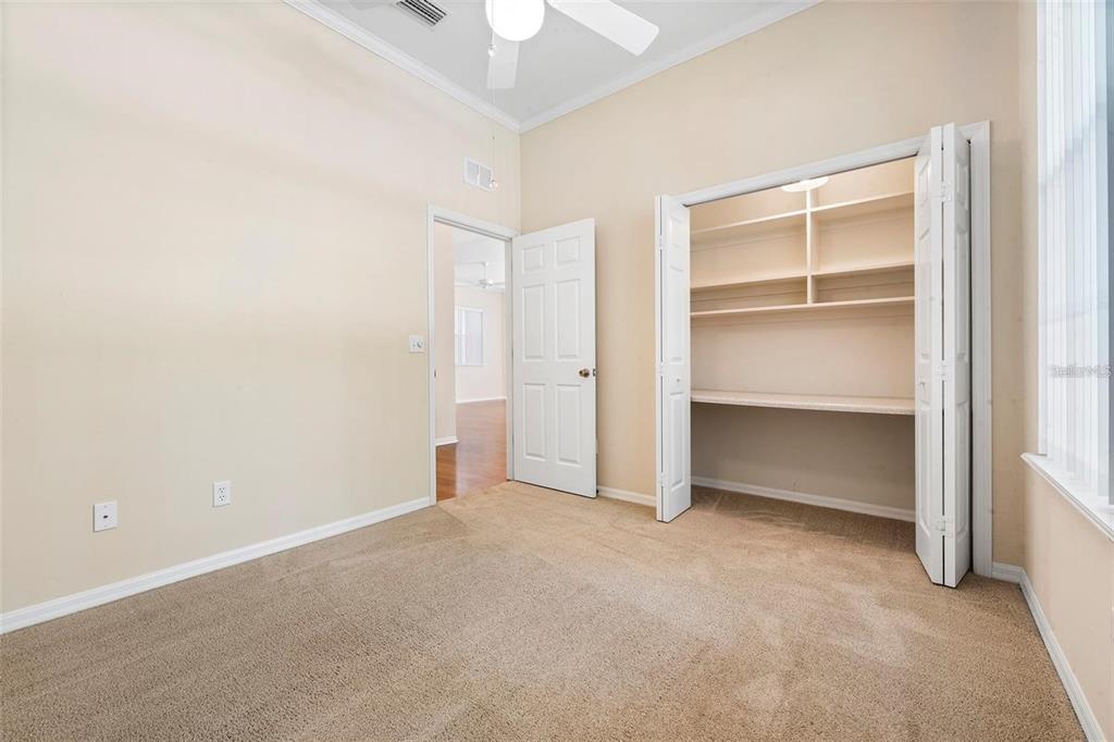 8668 Southwest 77th Avenue Gainesville, FL 32608 - Photo 16 of 29 a view of an empty room with a closet