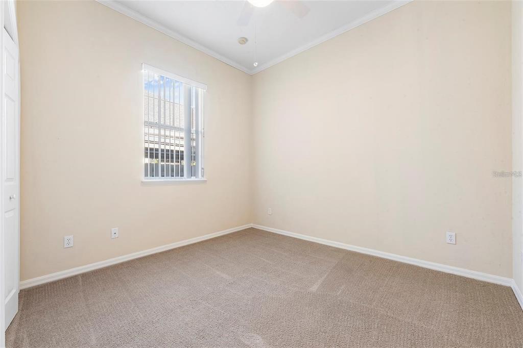 8668 Southwest 77th Avenue Gainesville, FL 32608 - Photo 19 of 29 an empty room with a window