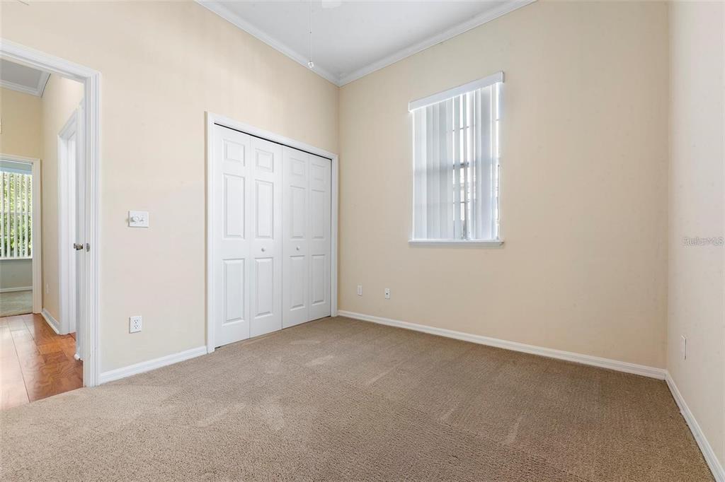 8668 Southwest 77th Avenue Gainesville, FL 32608 - Photo 20 of 29 an empty room with windows