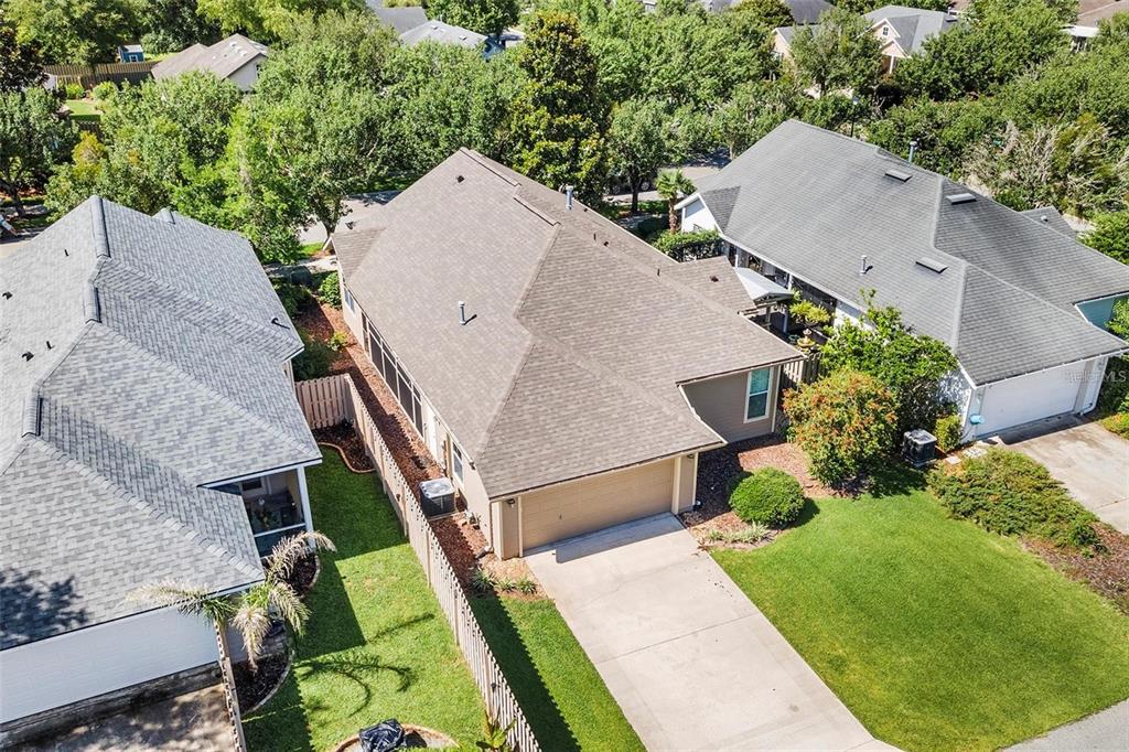 8668 Southwest 77th Avenue Gainesville, FL 32608 - Photo 27 of 29 an aerial view of a house with a yard and pool