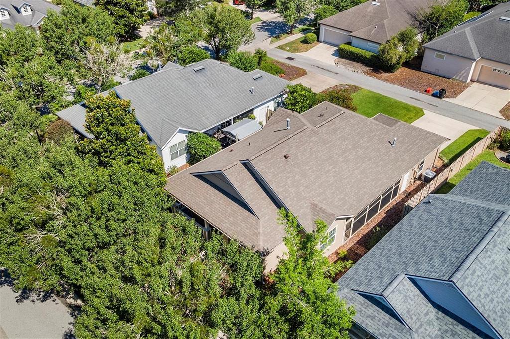 8668 Southwest 77th Avenue Gainesville, FL 32608 - Photo 28 of 29 an aerial view of a house with garden space and street view