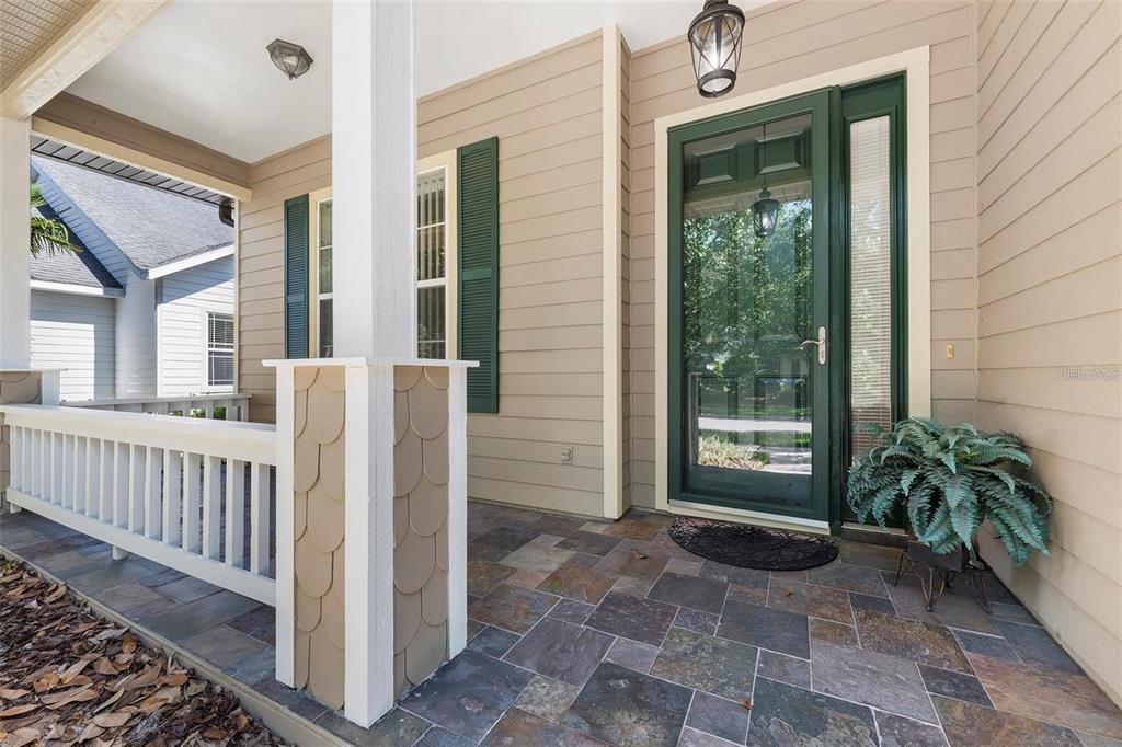 8668 Southwest 77th Avenue Gainesville, FL 32608 - Photo 4 of 29 a view of a entrance with stairs