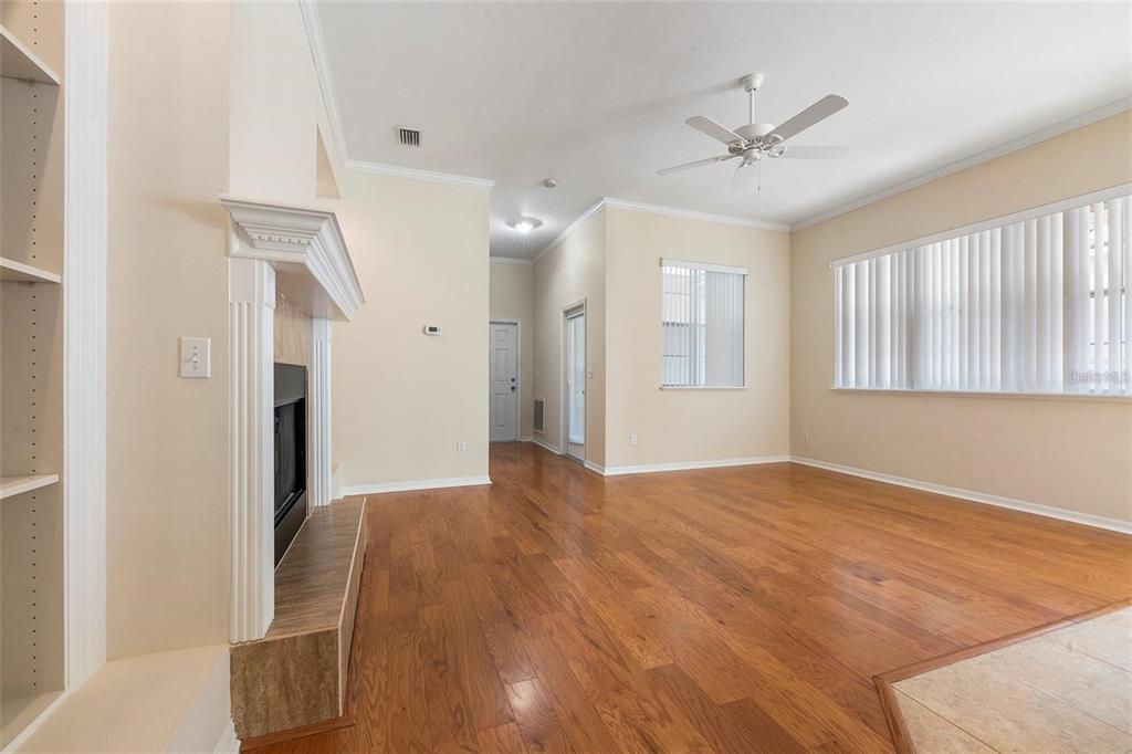 8668 Southwest 77th Avenue Gainesville, FL 32608 - Photo 6 of 29 a view of a livingroom with a ceiling fan and window