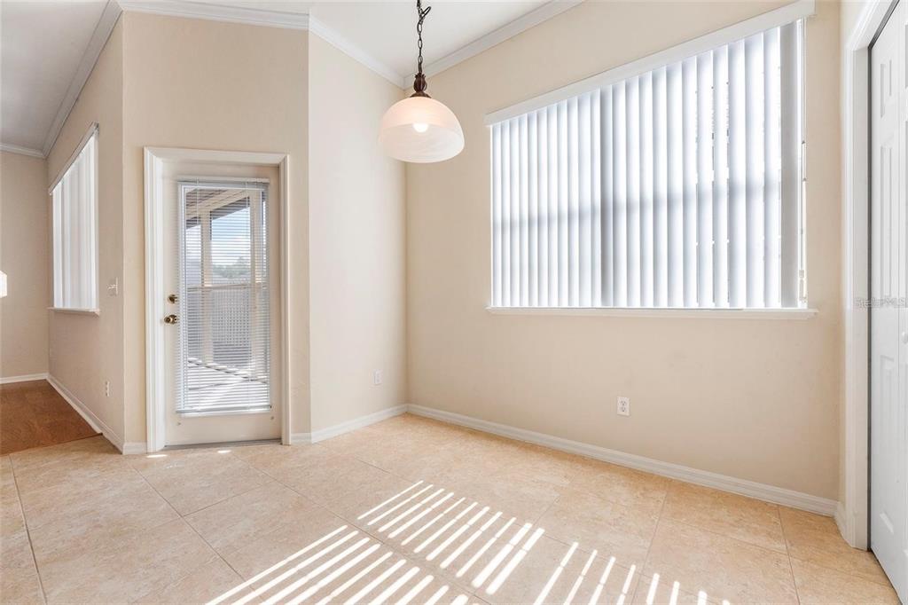 8668 Southwest 77th Avenue Gainesville, FL 32608 - Photo 9 of 29 a view of an empty room with a window