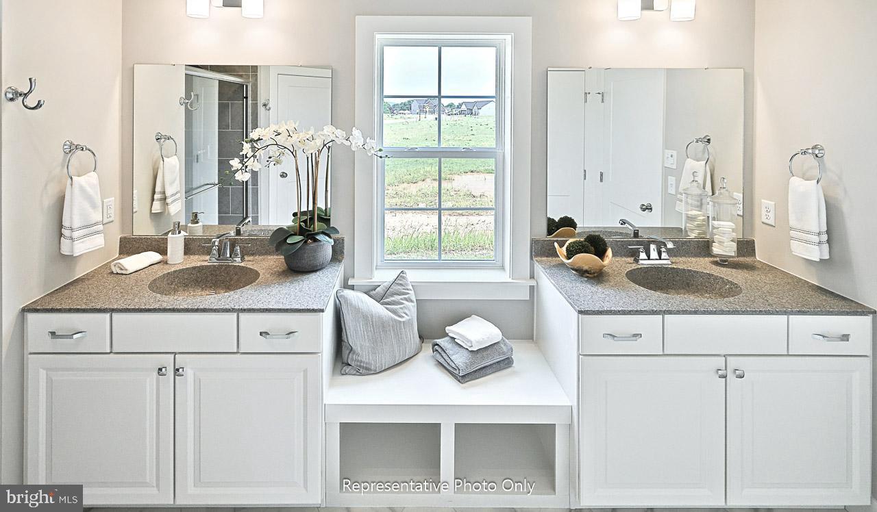 116 Washington Crossing York, PA 17404 - Photo 19 of 32 a bathroom with sink double vanity and a mirror